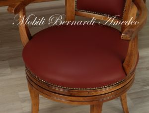 Classic style swivel chair with upholstered wooden structure